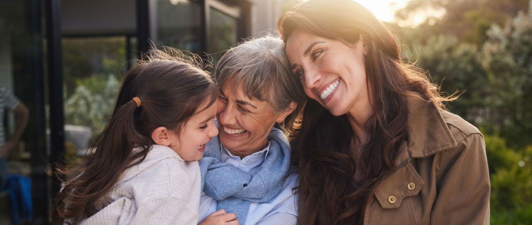 multi-generational family standing outside