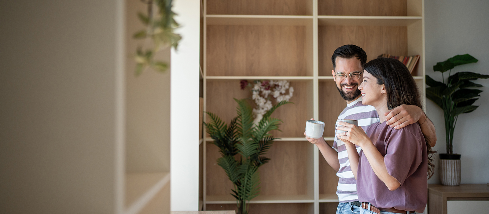 happy couple in new home