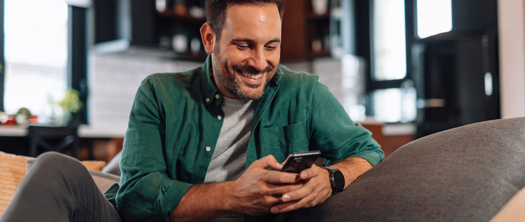 man using a smartphone