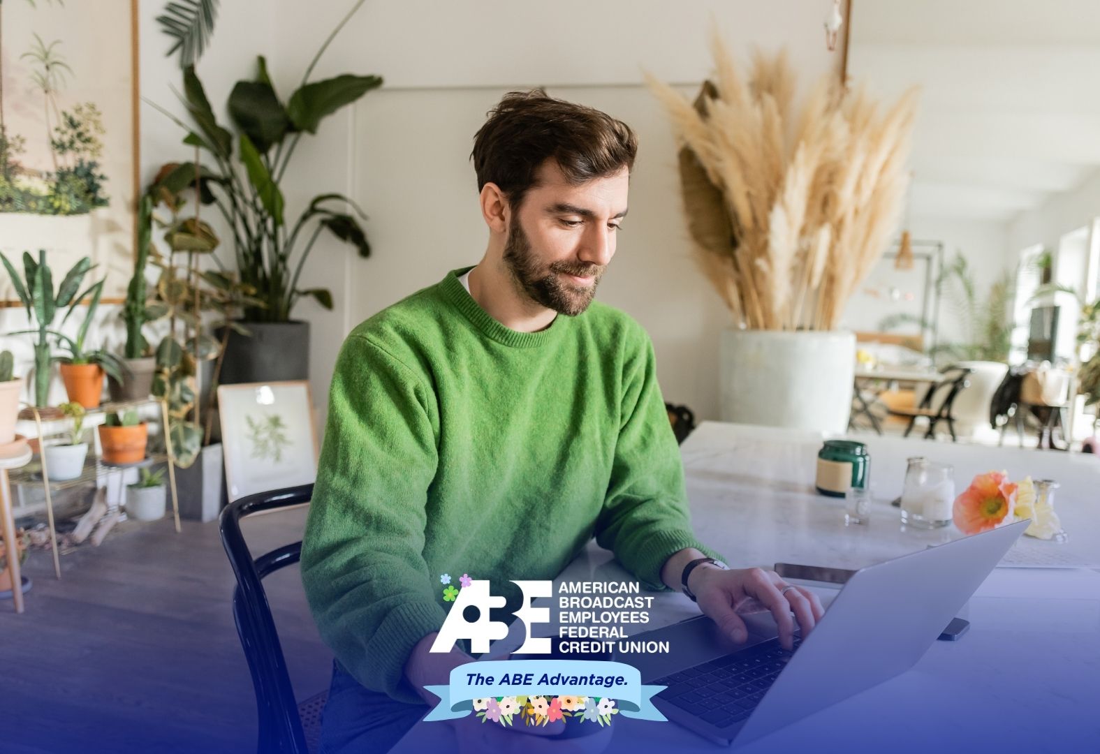 happy man working on laptop